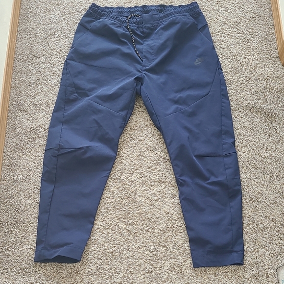 NWOT Nike Tech Blue Pants - Picture 1 of 7